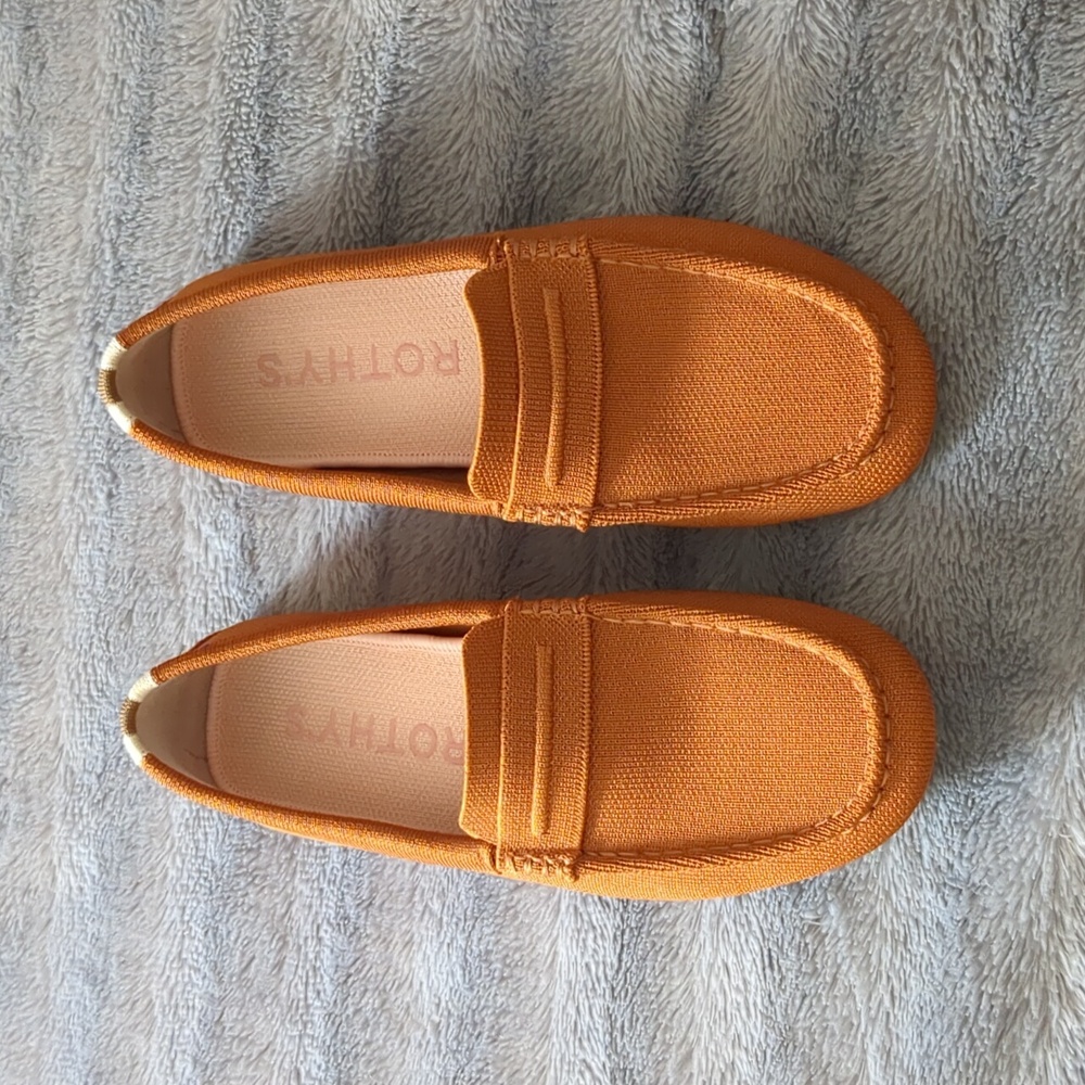 Dark orange Rothy's driving shoes